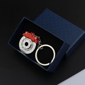 سلسلة مفاتيح أنيقة على شكل قرص فرامل مع مكبس فرامل، سلسلة مفاتيح سيارات سباق من سبيكة معدنية، قلادة حقيبة ظهر