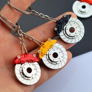 سلسلة مفاتيح أنيقة على شكل قرص فرامل مع مكبس فرامل، سلسلة مفاتيح سيارات سباق من سبيكة معدنية، قلادة حقيبة ظهر